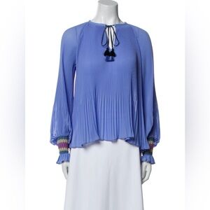 Helena Tassel Blouse by the brand
Derek Lam 10 Crosby. Size 4
